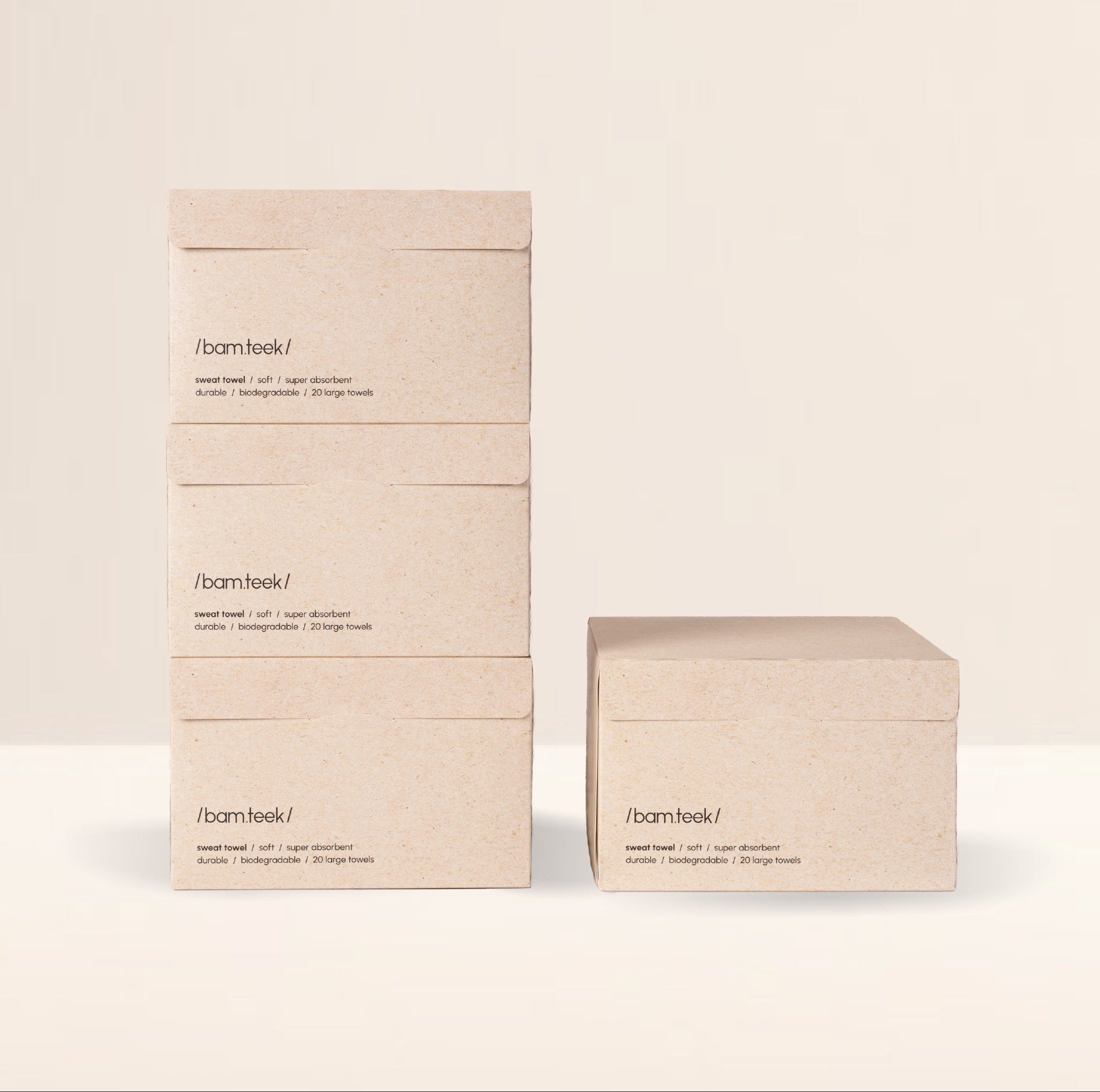 Stack of Bamteek sweat towels in eco-friendly packaging, promoting the Sweat Bundle for active skincare.